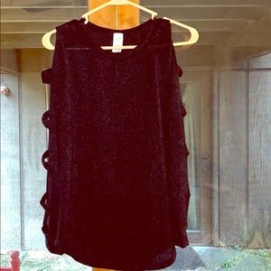 Black sweater with long sleeves.